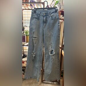 Distressed Light Blue Denim Jeans